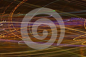 Fancy, colourful neon signs - abstract background with irregular   light lines. photo